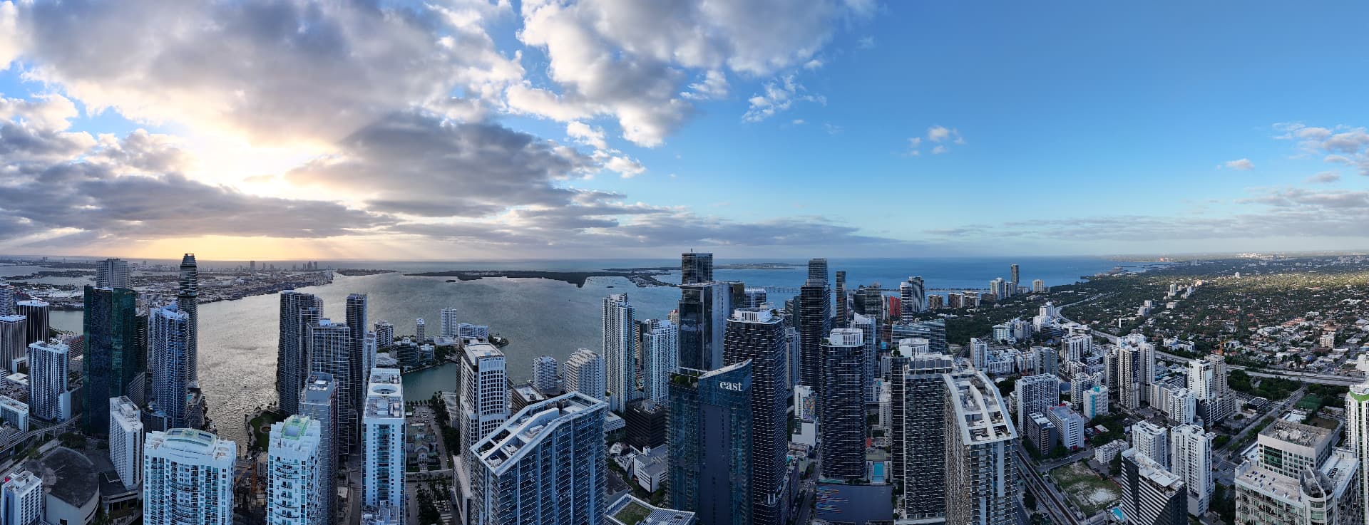 Aerial view of the Miami skyline and Biscayne Bay at sunrise